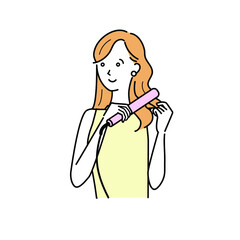 アイロンで髪を巻く女性