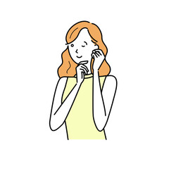 ピアスをつける女性