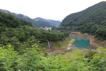 green waterfall landscape misty mountains Shima, Gunma, Japan