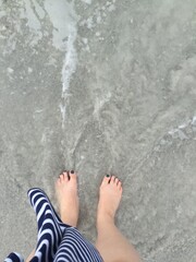 Toes in the ocean 
Florida