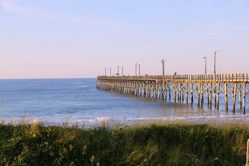Fototapeta na wymiar Summer morning at seaview pier, NC