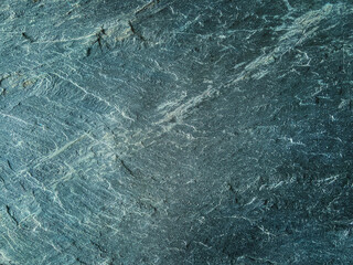 Teal raw unfinished stone surface for interior and exterior design and project