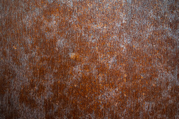 Rusty metal texture background. Old oxidized copper surface. Corrosion wallpaper.