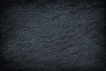 Dark grey stone / black slate stone background or texture
