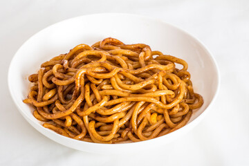 XO sauce mixed with udon noodles
