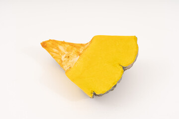 Naklejka premium Slice of Japanese pumpkin on white background.