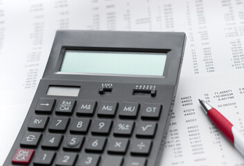 Financial activity, accounting, tax calculation or saving and investment, black calculator with pen