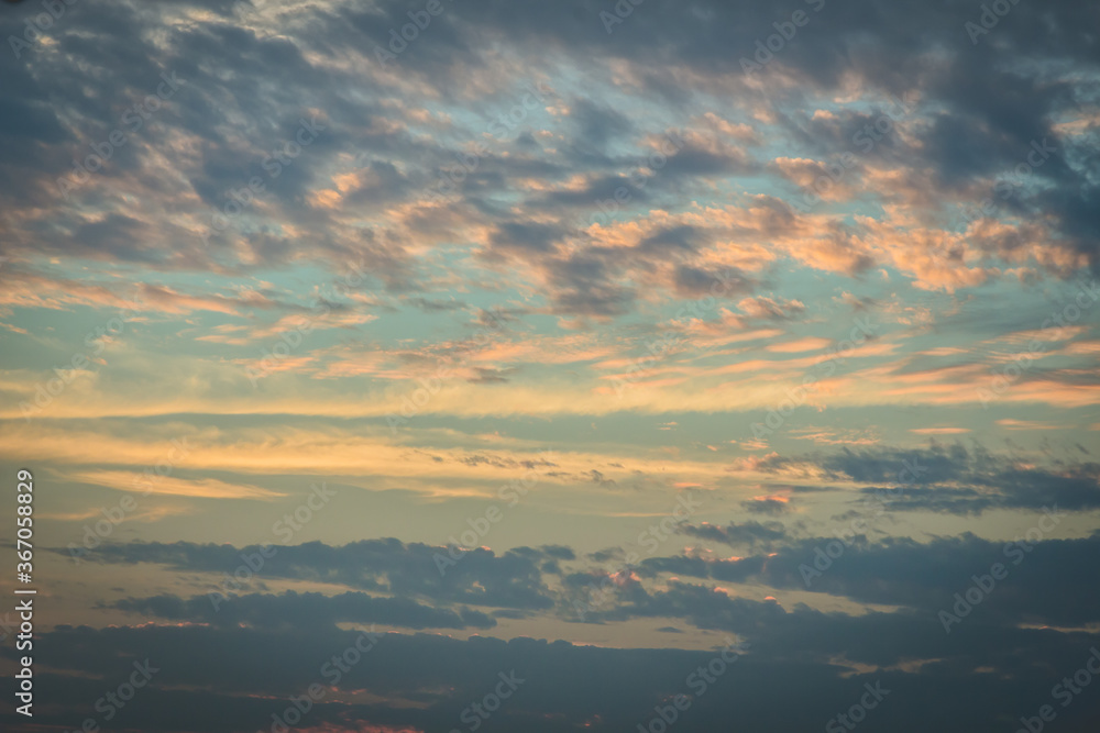 Poster sunset with clouds and light rays other atmospheric effect for use as a background image