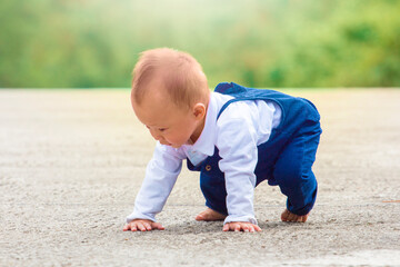 A baby learns to walk and take a full body photo