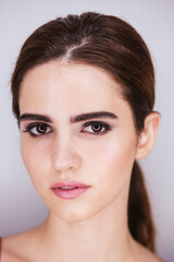 Obraz premium Portrait of a woman with make-up on a white background, make-up concept