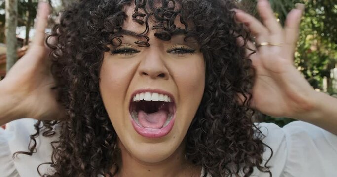 Closeup of angry woman. African American girl showing fear, terror and frustration. Cinematic 4K.