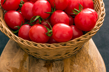 Fototapeta na wymiar Fresh plump cherry tomatoes