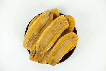 Fresh banana slice stacking on dish photo on white background