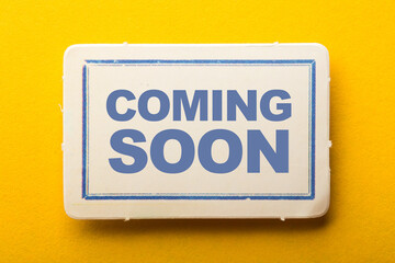 Coming Soon Label On Yellow Background