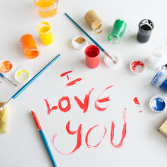 Top view of  "I love you" text on white background, artistic creative occupation, love concept