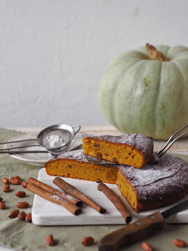 Pumpkin muffin on a white background.Home cooking. Rustic cooking style.