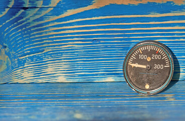 pressure gauges on a gray surface. vintage appliances