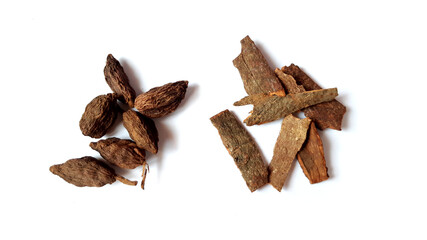 Black Cardamom and Cinnamon Dry Spice Isolated on White Background