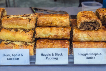 Pasties for sale on weekly food market on Grassmarket in Edinburgh city, Scotland, UK