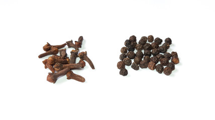 Black Pepper And Aromaticum Clove Isolated on White Background