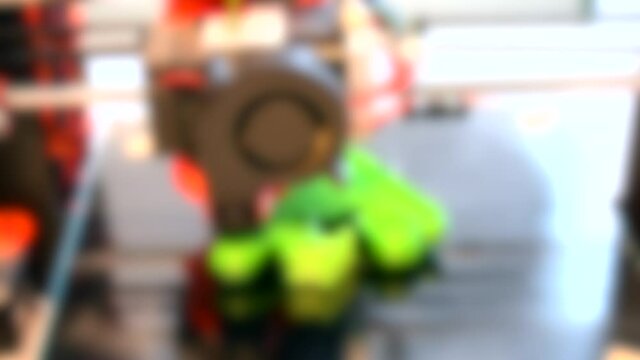 Blurred background. 3d printer building abstract object