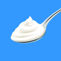 Spoon of yogurt on blue background