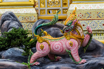 Fototapeta premium Close-up Himmapan animal statue in temple Thailand.