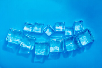 Cool and transparent ice cubes in summer