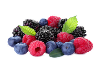 Pile of different ripe tasty berries with green leaves isolated on white