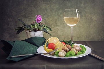 Still life with escargot and wine glass