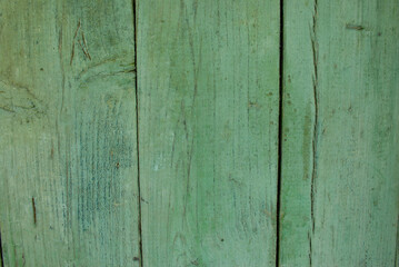 Naklejka premium Old tumbledown weathered vertical wood boards background with cracks, shabby rustic blue barn timbered siding aged withered faded flooring surface. Obsolete wall blank abstract rustic rundown texture.
