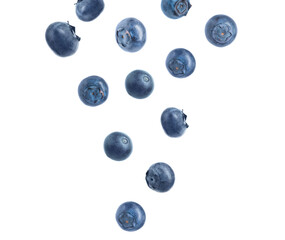 Fresh ripe blueberries falling on white background
