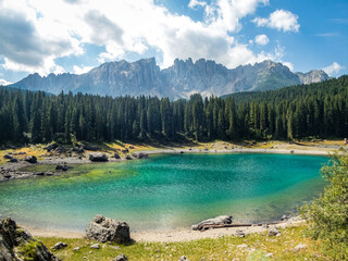 Karersee below the Karerpass at the foot of the Latemar massif