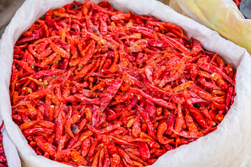 The market is full of red, dried chilies