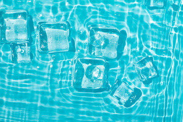 Cool and transparent ice cubes in summer