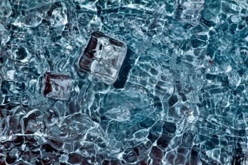 Cool and transparent ice cubes in summer