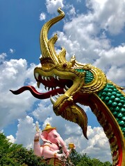 Fototapeta na wymiar The Great Naga and the Big Ganesha in Thai temple
