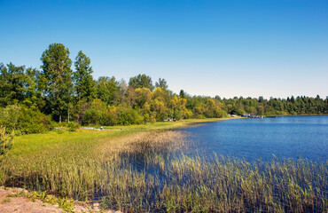 View of the continental coast of Tervu Bay, from the bridge to Koyonsaari Island. Ladoga lake. Karelia. Russia