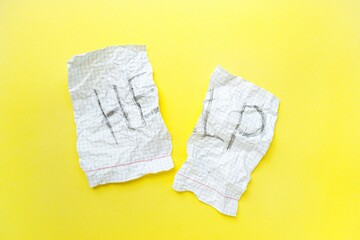 Text help on a white sheet of notebook in a cage on a bright yellow background. Step by step.