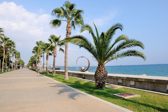 View of Limassol promenade with palm trees on a beautiful sunny day in Cyprus