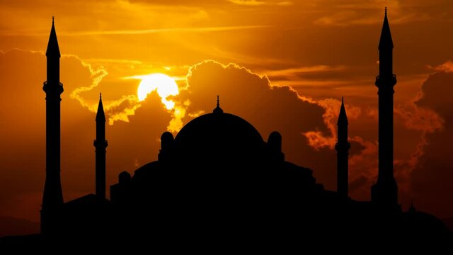 Ayasofya or Hagia Sophia Mosque in Istanbul Time Lapse at Sunset with Red Sun and Fiery Sky, Turkey