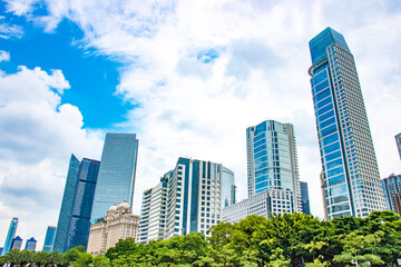 Fototapeta premium Look up at the magnificent modern city buildings