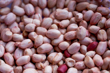 A pile of shelled peanuts close-up