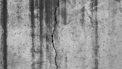 Fototapeta premium Building wall concrete surface. Crack. Background image for web design. 