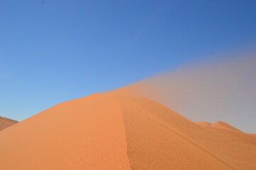 Fototapeta na wymiar The red sand dunes of Sossusvlei in the Namib Desert, Namibia