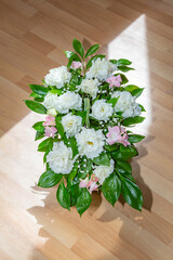 Multicolored bouquet of fresh summer flowers in festive packaging for a birthday or anniversary