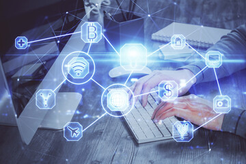 Social network theme hologram with businessman working on computer on background. Concept of world wide web. Multi exposure.