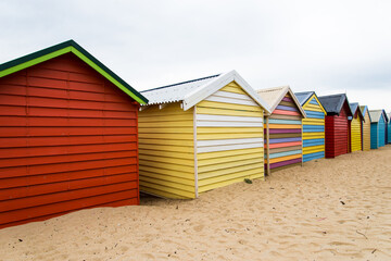 Colourful wooden huts at the beach