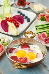 Delicious traditional turkish breakfast on wooden table