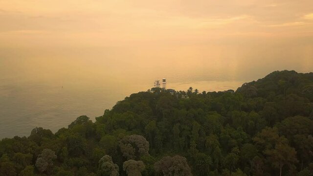 Aerial view of Cape Rachado Lighthouse with trees Port Dickson Malaysia